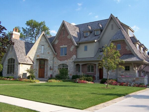 Home exterior featuring 3/4 shake roofing installed by Tilden Roofing.